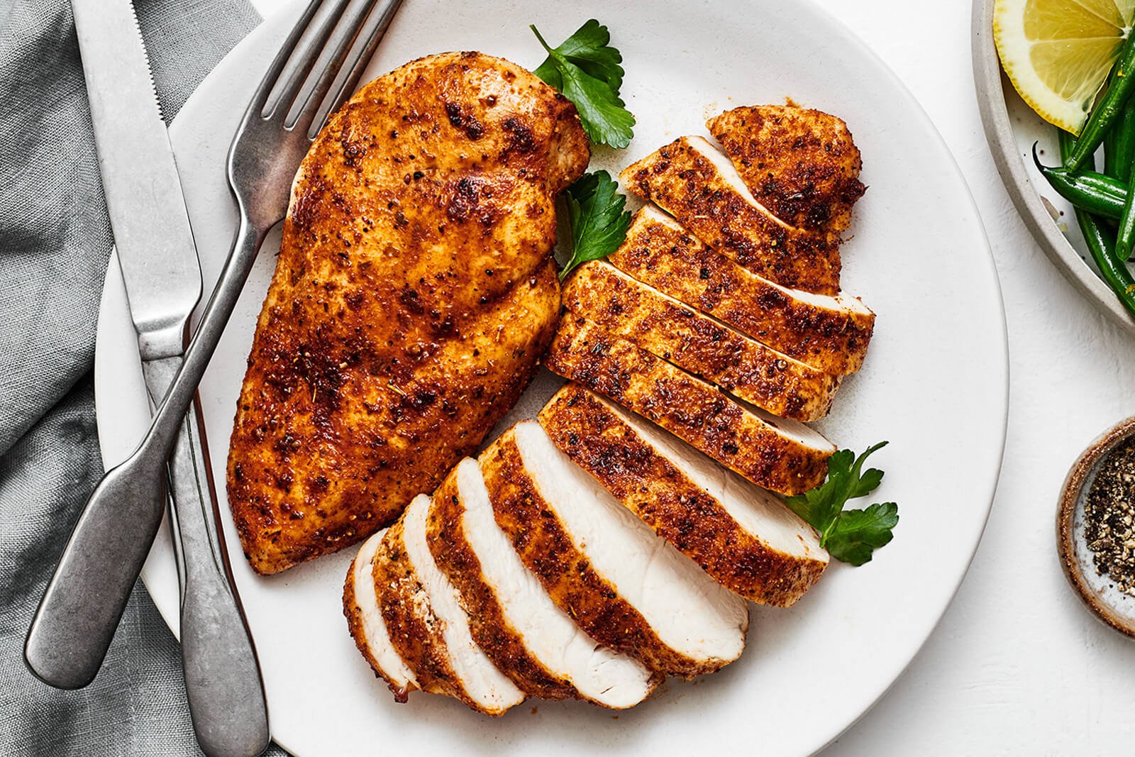 A plate of air fryer chicken breasts