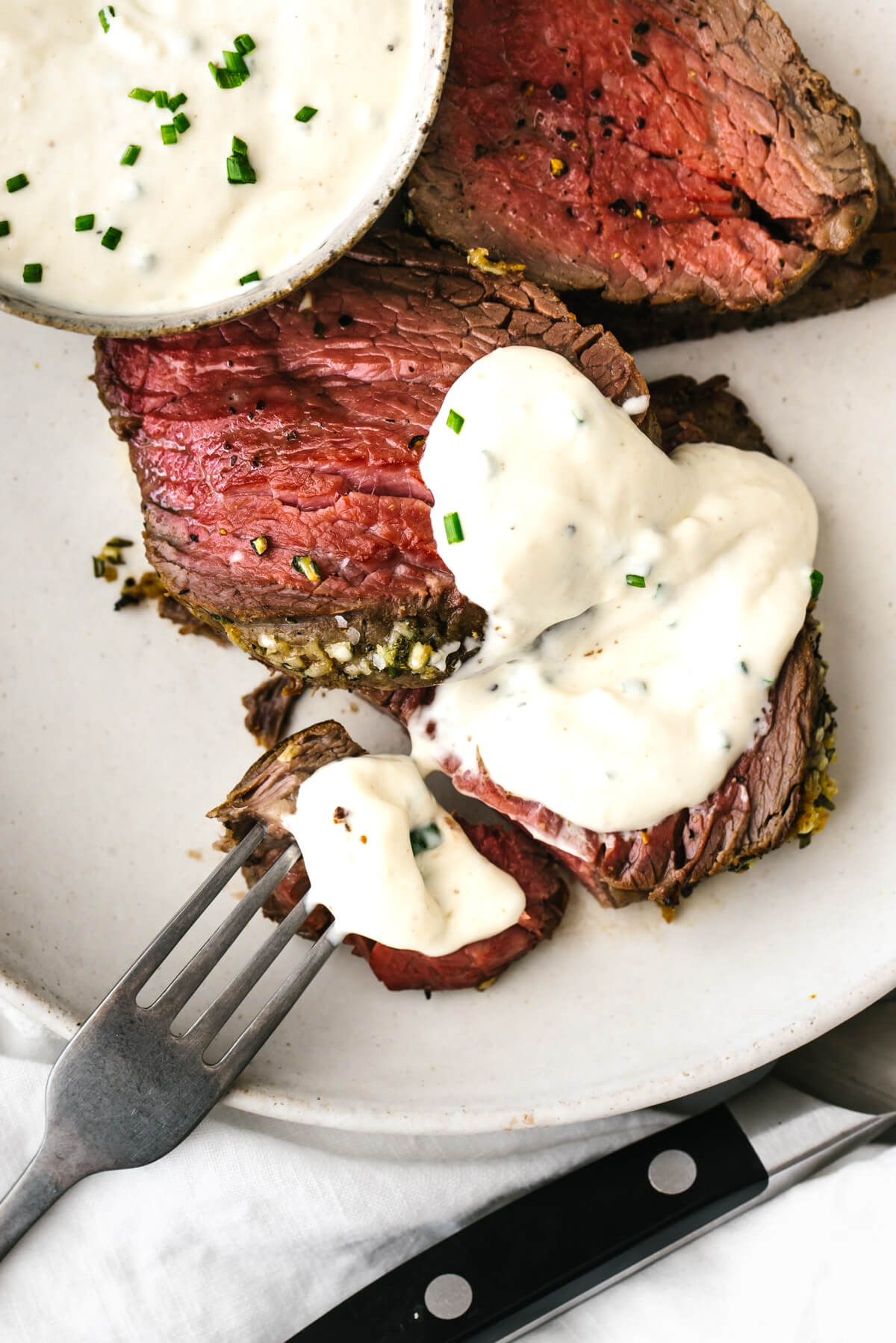 Slices of beef tenderloin with horseradish sauce
