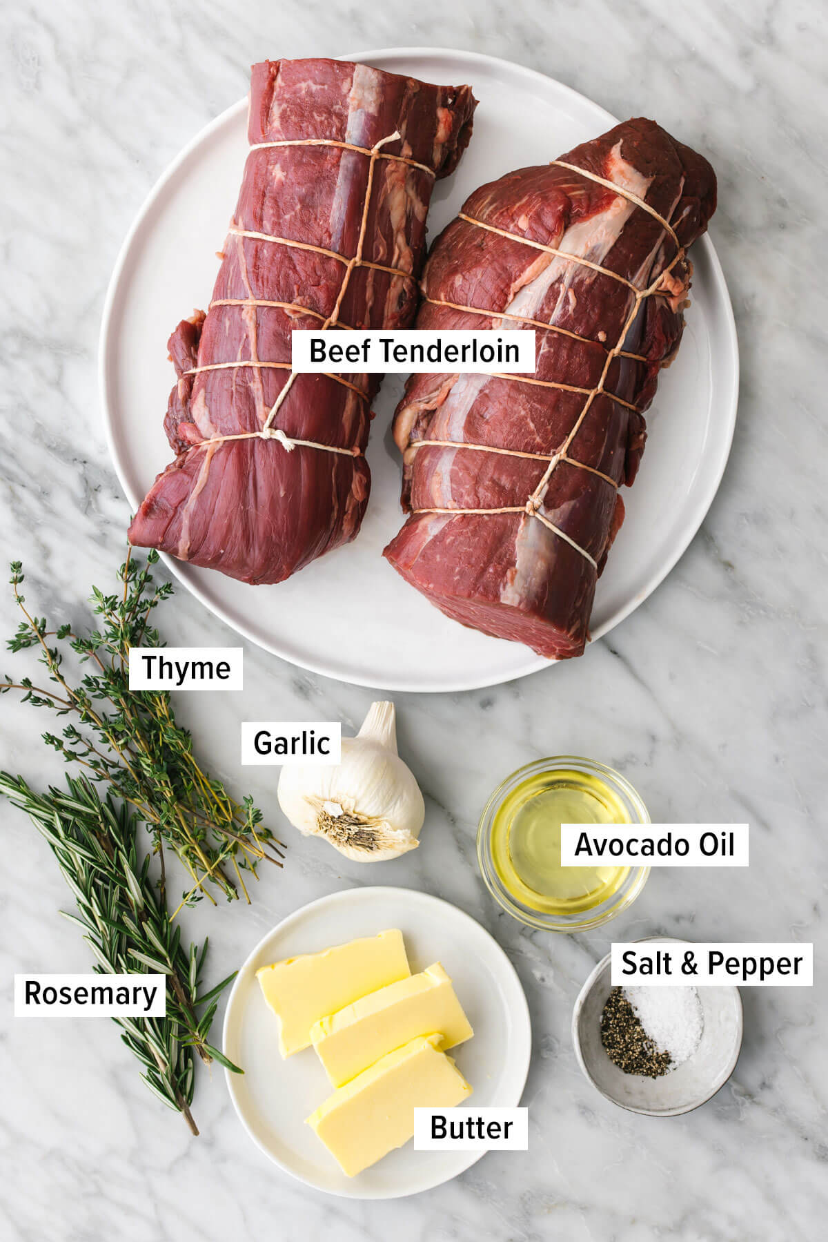 Ingredients for beef tenderloin roast on a table.
