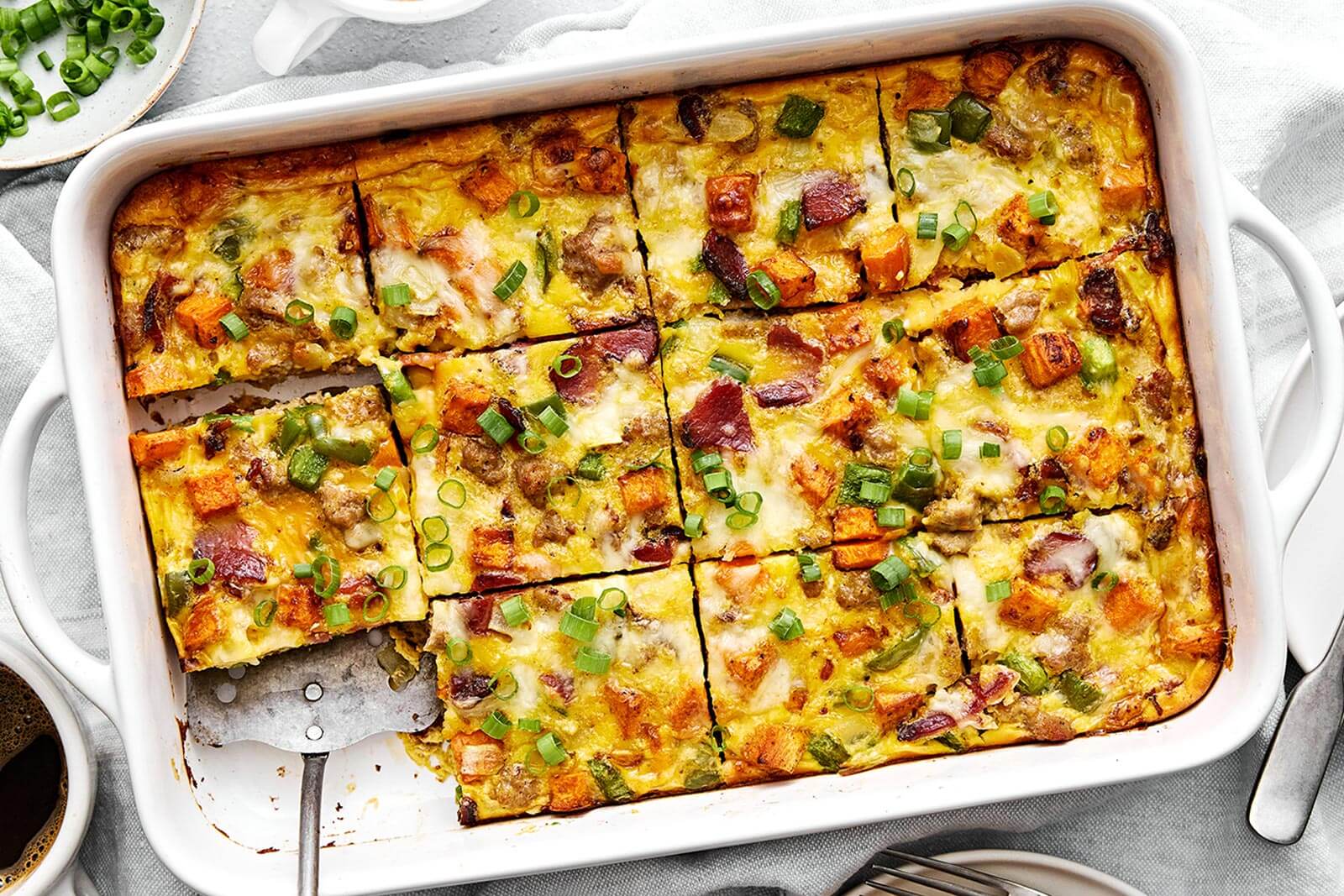 A white baking dish with the best breakfast casserole.