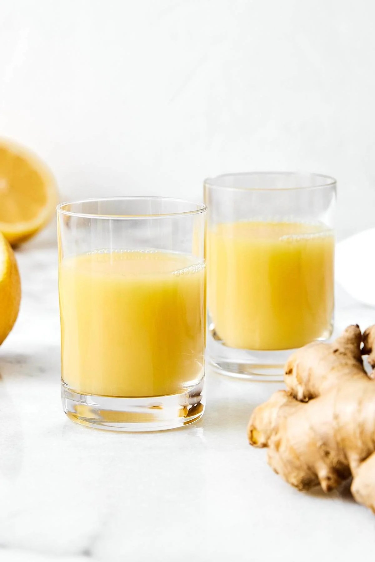 Ginger shots in glass cups.