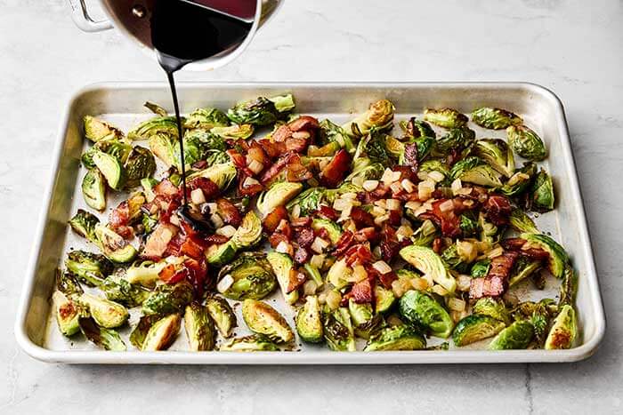 A sheet pan of balsamic bacon Brussels sprouts.
