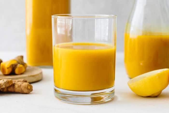 A glass of jamu juice.