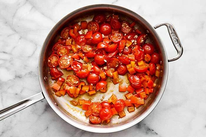 A pan with cooked tomatoes.
