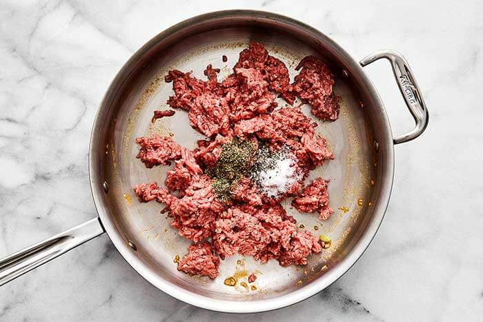 Cooked ground beef in a pan.