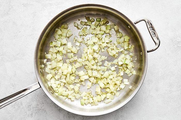Cooked onions in a pan.