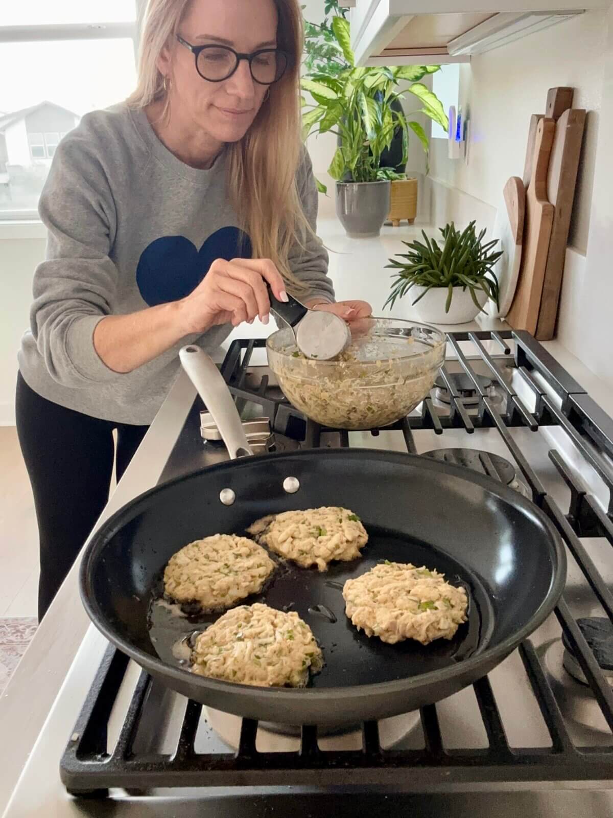Lisa testing the crab cakes recipe.