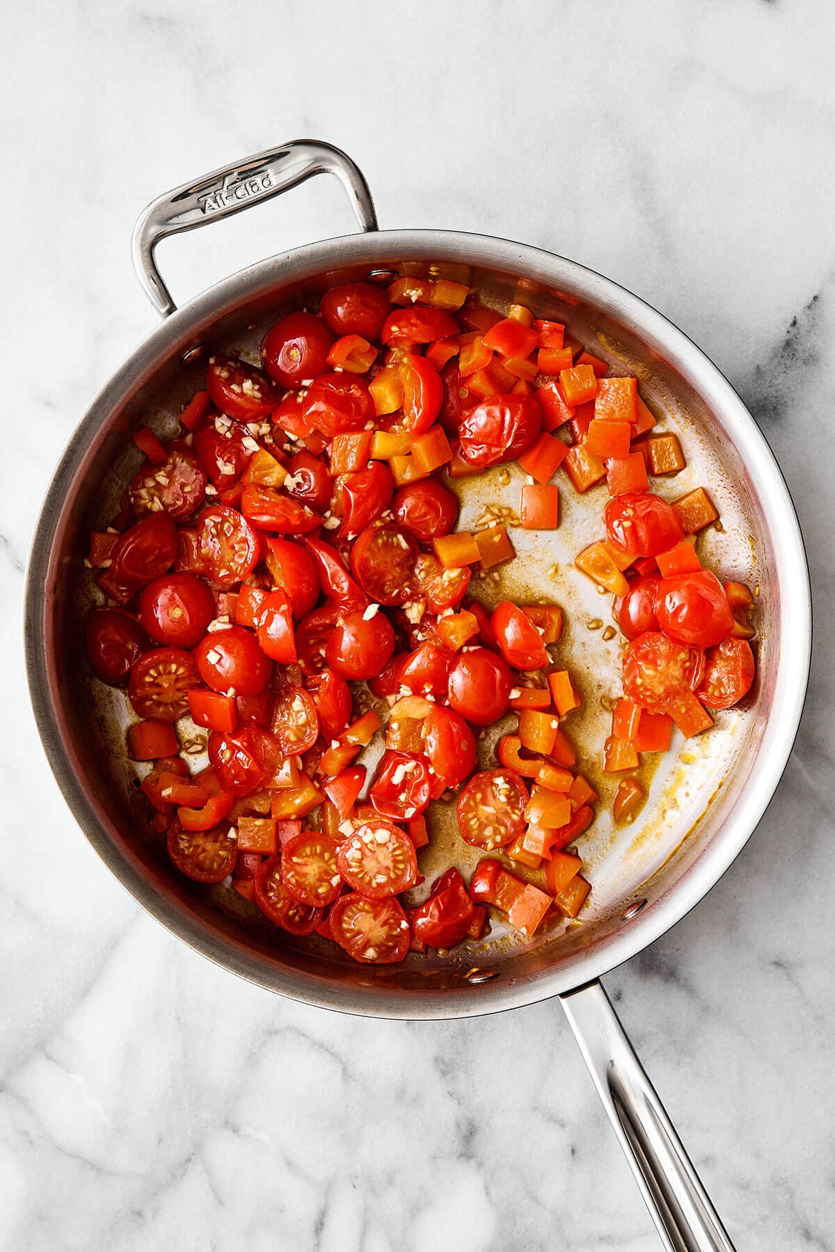Cooked tomatoes in a pan.