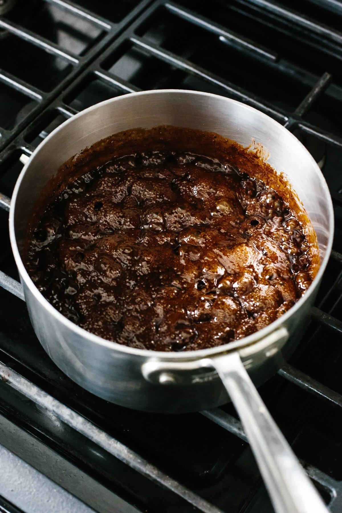 Mixing chocolate mixture in a pot.