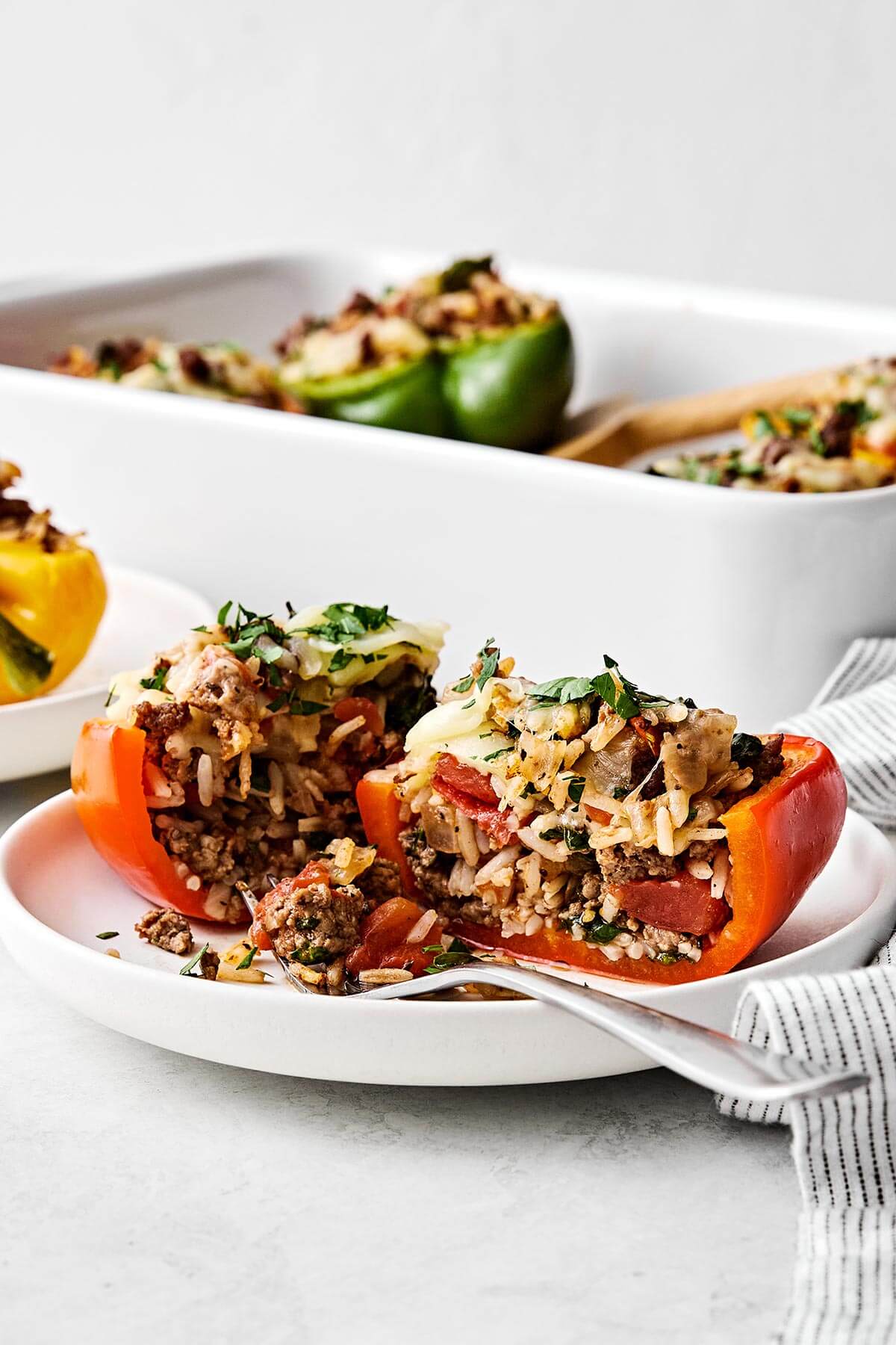 Stuffed peppers sliced in half.